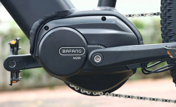 Close-up of a Bafang M200 e-bike motor and crank area on a modern electric hybrid bike