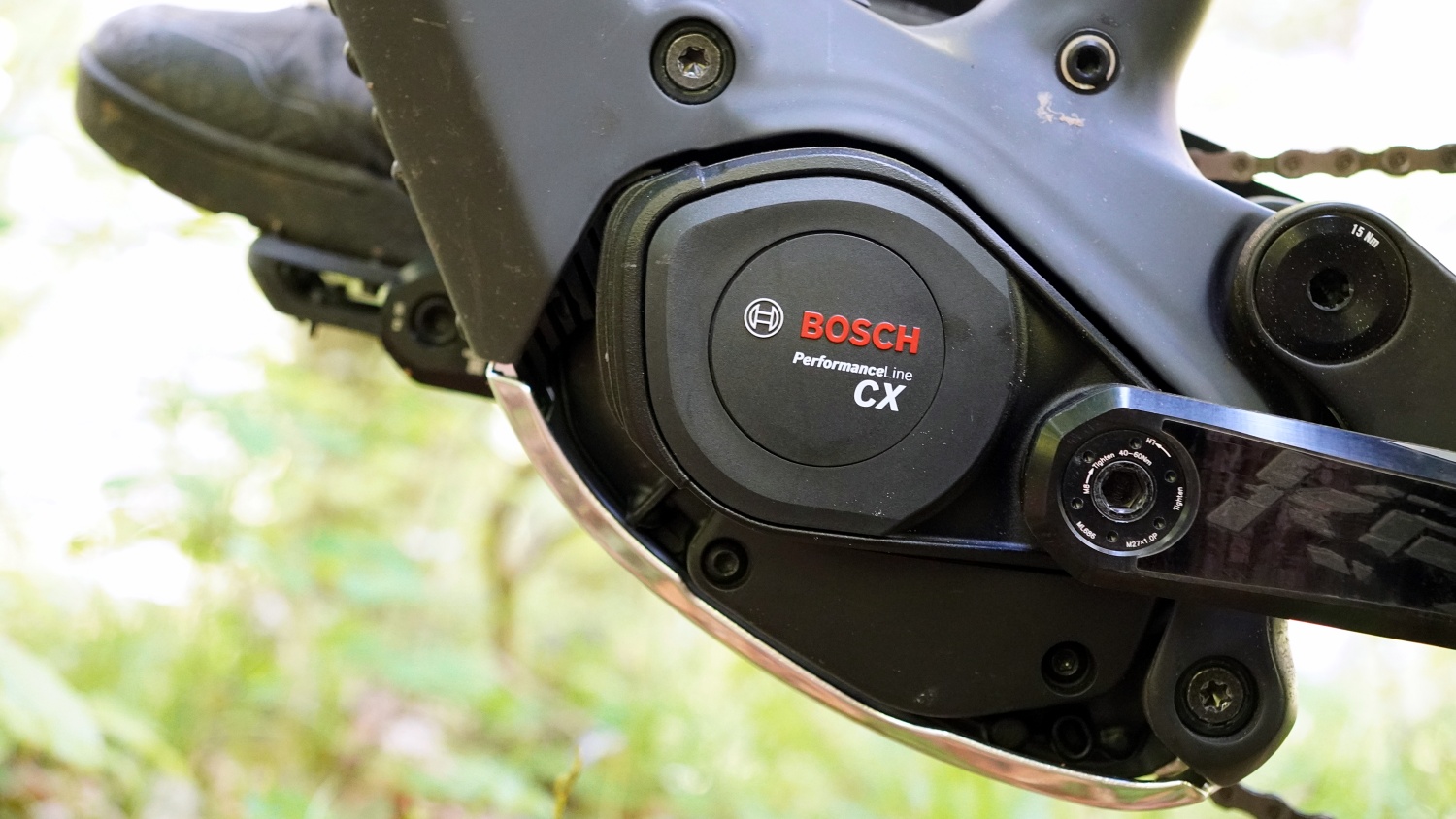 Close-up of a Bosch CX e-bike motor and crank area on a modern electric bike