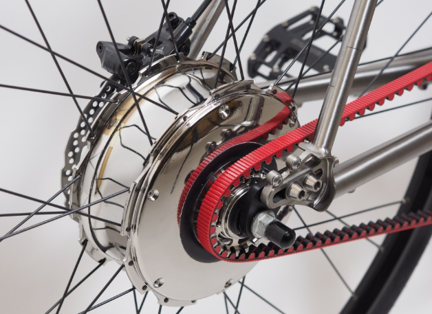 Close-up of a Zehus rear hub motor fitted to a belt-drive e-bike